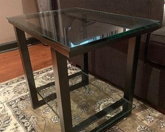 $150 - Glass End Table - black iron frame inset with tempered glass — 24”L x 17”W x 21.5”H