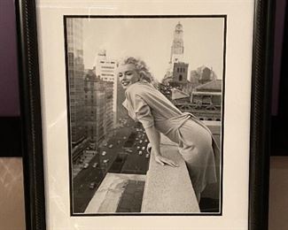 $150 - Framed Art of Marilyn Monroe at the Ambassador Hotel, New York, c.1955 - 29” x 21”