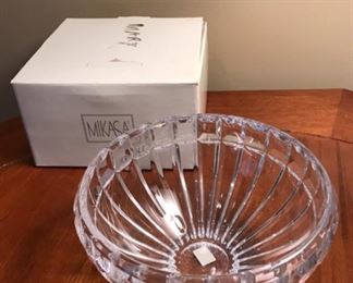 $35 - Brand-new Mikasa crystal vase, in the original box. It is a very heavy piece — 7.5” in diameter, 4.5” tall