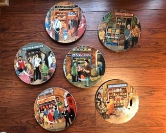 $300 Set of six William Sonoma Tuscan Storefronts Porcelain Dinner Plates by Guy Buffet, made in Germany. Each Plate Measures approx. 10 3/4" W . Excellent, like new condition.  Includes wall hangers on the back of each plate.