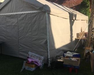 This tent is filled with puzzles, games toys, fabric, buttons, stationary, sewing machine and all things sewing, books included. Large set of Nancy Dre and cookbooks.