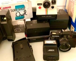 A variety of Cameras — Polaroids and others