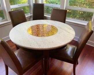 travertine table with Dureta ceramic inlay - handmade in Italy - leather Pottery Barn chairs
