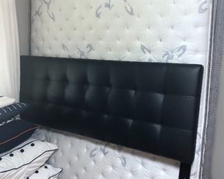 Queen Mattress and Box springs.  Shown with tufted black headboard