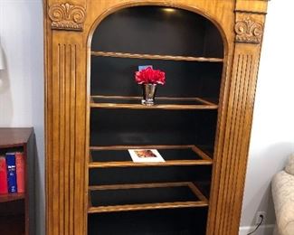 Milling Road Lighted display cabinet - This beautiful piece features bookshelves  on each side.  Glass inserts on each shelf.