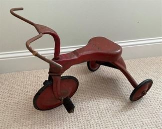 Antique children's pedal tricycle.