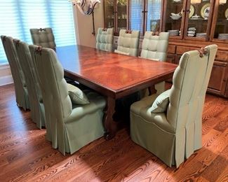 Artitalia tavolo "Fratino" dining table from the "Vere Antichità" collection. Rectangular top with inlaid walnut centerpiece raised on serpentine trestle base, legs joined by a stretcher and scrolled iron elements, resembling those typical in the convents of northern Italy during the 17th century. Handcrafted in Italy.