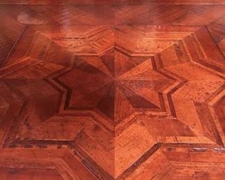 Antique wood inlay pattern on the dining table