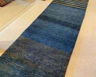 Rug designed by Odegard 18 feet long and 3 feet wide. Square can be removed to change length.