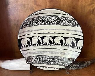 African art and horns.