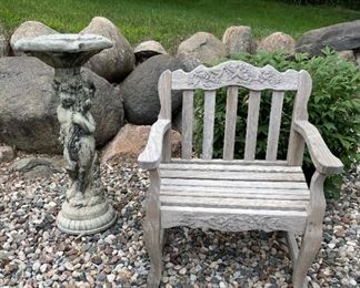 Teak bench and cement bird bath