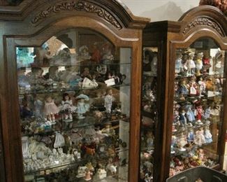 Hundreds of dolls and collectibles. Display Cases are for sale. 