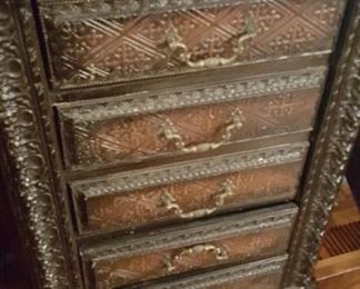 A pair of ornate chests.