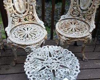 Cast Iron Chairs and Tables.