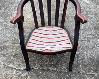 gorgeous dark wood (mahogany?) curved armchair; comes in a set with a matching rocker and small loveseat. 