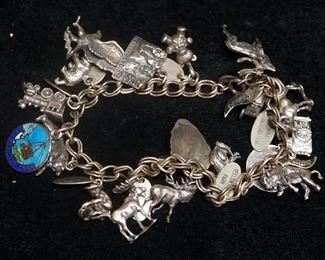 Sterling Silver Bracelet With Numerous Charms, Many Sterling, Approx 70.7 g Total Weight