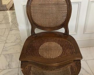 Antique caned "potty chair