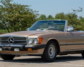 1981 MERCEDES BENZ 380SL CONVERTIBLE.
Hard-top convertible with gold exterior and brown leather interior.  Automatic transmission with a 1983 Euro 500 engine.  Odometer reads 76,600 miles, TMU.
Estimate $13,000-16,000
