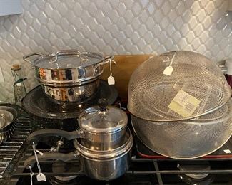 Large enamel pot is labeled Clam Broth with a spigot 