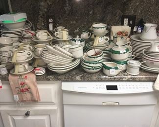 various kitchen ware and table linens