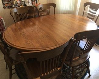 Oak dining table with 6 chairs