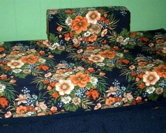 one of two twin beds/cots
