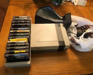 vintage nintendo game system with games