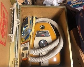 vintage vacuum in box