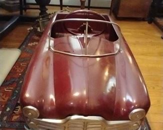 Early 1950's Kid's You Pedal Car in mint working condition, modeled after the Ford Zephyr Convertible.  Asking only 995. Or best offer.