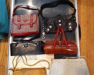 Prada bag, authentic, and Chloe Bag, authentic, both have protector bags for storage time.  Lower right corner is a Whiting & Davis Summer Metal Mesh Evening handbag.