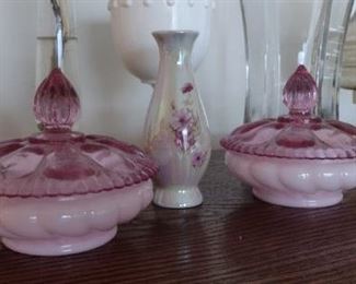 A pair of powder dishes. Pink bowls light purple pointed lids.