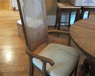 VIEW OF THE ARM CHAIR THAT GOES WITH THE TABLE.