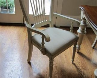 CLOSE-UP OF THE ARM CHAIR WITH THIS SET.