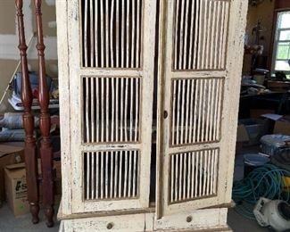 Unique birdcage style entertainment center armoire