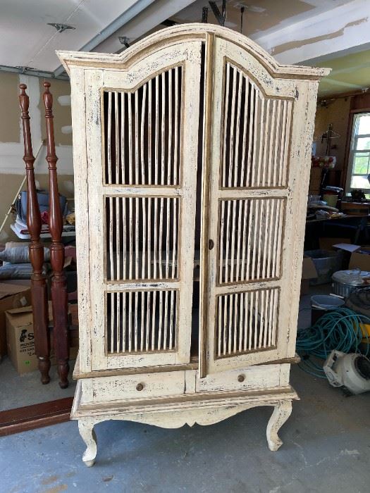 Unique birdcage style entertainment center armoire