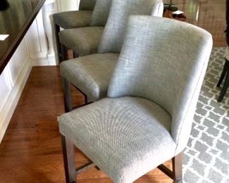 Four Barrelback Gray Upholstered Counter Chairs