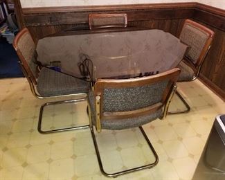 Glass Top Dining table with 4 chairs.