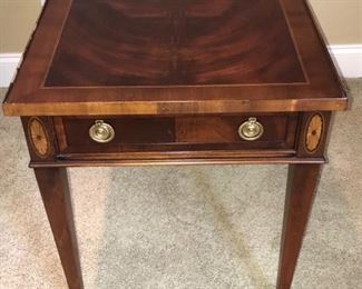 Beautiful wooden side table with gold detailing as well as a drawers. It measures 27” x 19” x 23” and has a drawers width/depth of 15” x 3”. https://ctbids.com/#!/description/share/949820