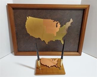 United States framed wall hanging. States are made of various metals. Pen holder has copper United States mounted and holds 2 pens. Wall 21x15" Pen 7.5x5.5" https://ctbids.com/#!/description/share/949844