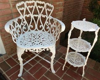 This is a sturdy iron chair measuring 31"tall at the back and 24 " across. The plant stand measures 27" tall and 11"across. https://ctbids.com/#!/description/share/949873
