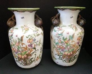 These are beautifully done Asian vases measuring 13" high. https://ctbids.com/#!/description/share/949871