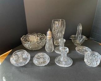 Variety of crystal and glass pieces. I suspect some pieces are Waterford but can not confirm with markings. https://ctbids.com/#!/description/share/949926