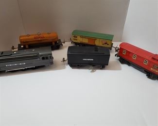 Vintage Lionel train in original box. Includes engine, caboose, tanker, coal bin, boxcar tracks and some other small parts. Engine 9" long. https://ctbids.com/#!/description/share/949829