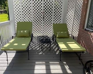 Two Iron chaise lounges in beautiful condition. Includes weather safe cushions and pillows for both (easily cleaned). Also includes a sent of 3 iron nesting tables. Beautiful addition to your outdoor oasis for the summer time! Tables: 19 1/2 x 19 1/2 x 16 Chaise Lounge: 72 x 26 https://ctbids.com/#!/description/share/949847