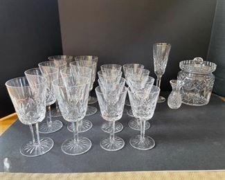 Set of 8 wine glasses, set of 8 sherry glasses, canister, champagne flute & a small vase. All Waterford with markings. https://ctbids.com/#!/description/share/949924