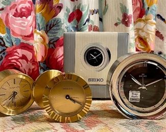 Item 22:  Seiko Beep Alarm Clock NIB:  SOLD                                                       Item 23:  Tiffany Brass Travel Clock (front): $65 (SOLD)                                             Item 24:  Tiffany Brass Clock (back left - monogrammed on cover):  $45