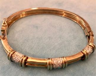 Item 288:  14K gold and diamond hinged cuff bracelet:  $1450.00