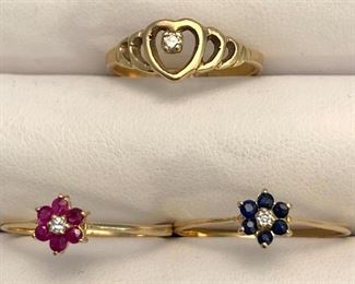 Item 259:  14K Set of 2 Rings with Ruby and Sapphire: $65                                                                                                                 Item 260:  14K Heart with Small Diamond: $65