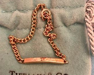 Item 236:  14K Tiffany Baby Bracelet inscribed "Lindsay":  $125