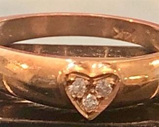 Item 300:  14K gold ring with three small diamonds:  $150.00